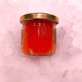 Tobiko naranja, huevas de pez volador ideales para sushi y cocina japonesa. Compra online con envío refrigerado. Pescadería online Pescado a Casa.