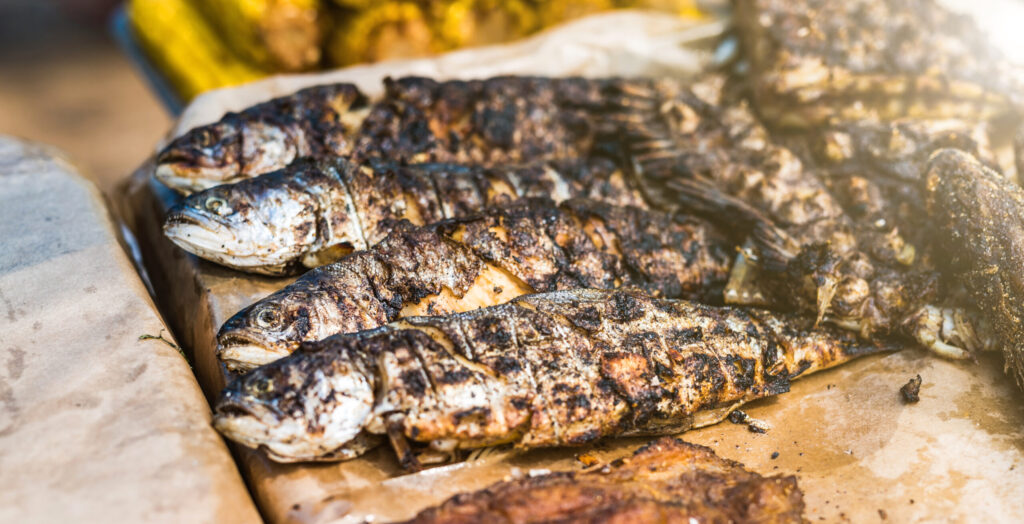 pescado a la brasa en vacaciones